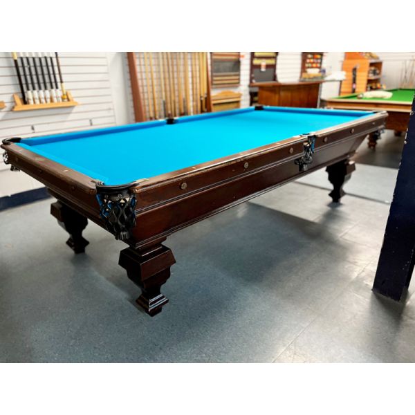 Amazing antique Brunswick Billiard Balke Monarch 9 foot pool table with rich looking Blue Cloth  Code : TABLE434BRU9P in great condition considering it's age. A rare and spectacular design with nicely detailed carved square legs. 