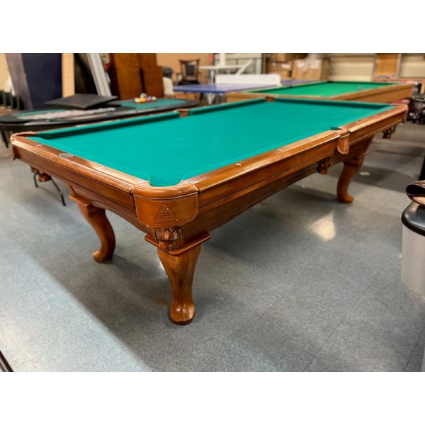 Used Legacy brand 8 foot pool table with natural quarried 1 inch slate and Queen Anne legs Code : TABLE455LEG8P
Made mainly with solid Maple hardwood and simulated leather pockets. 
Includes a one year warranty, Green billiard felt cloth and a used bill